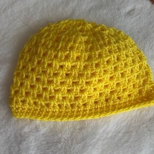 Yellow beanie hand made crochet.